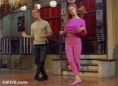 Man And Woman Dancing In Pink Pants GIF