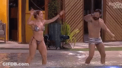 Man And Woman Dancing In Pool GIF