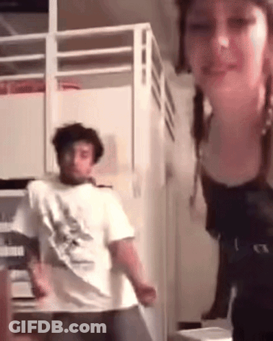 Man And Woman Dancing In Room With Bunk Bed GIF