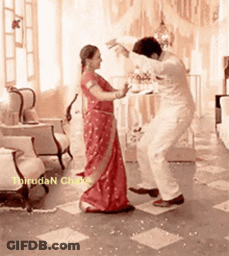 Man And Woman Dancing In Room With Thrudan Chake GIF