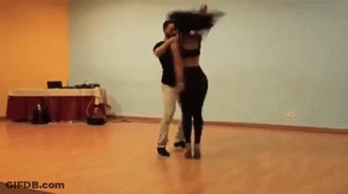 Man And Woman Dancing In Studio GIF
