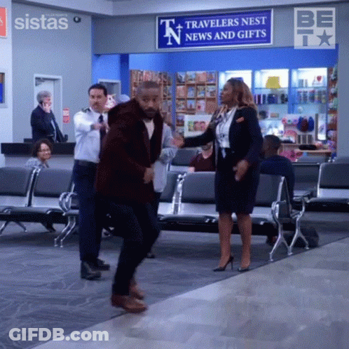 Man And Woman Dancing In Waiting Room GIF