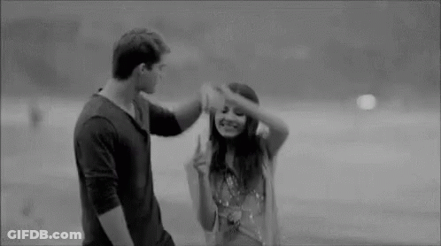 Man And Woman Dancing In Water GIF