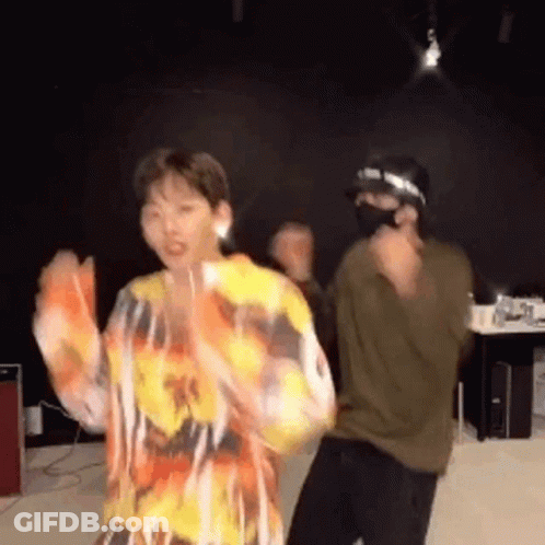 Man And Woman Dancing Man Wearing Mask GIF