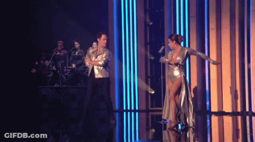 Man And Woman Dancing On Stage GIF
