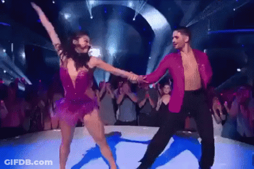 Man And Woman Dancing On Stage GIF
