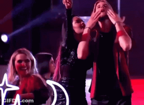 Man And Woman Dancing On Stage In Club GIF