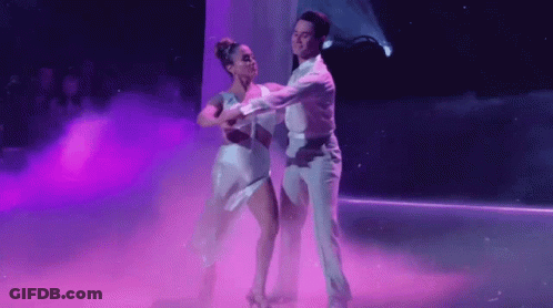 Man And Woman Dancing On Stage GIF