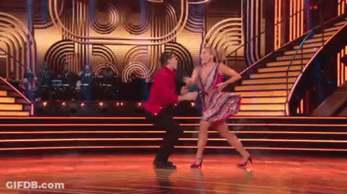 Man And Woman Dancing On Stage GIF