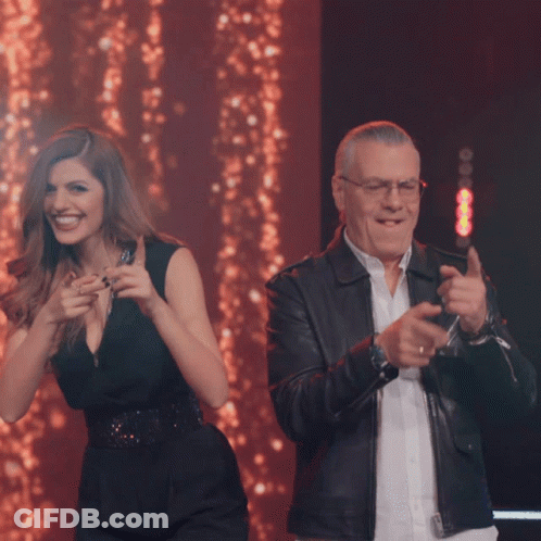 Man And Woman Dancing On Stage Smiling GIF