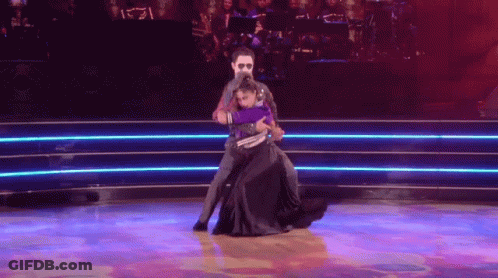 Man And Woman Dancing On Stage GIF