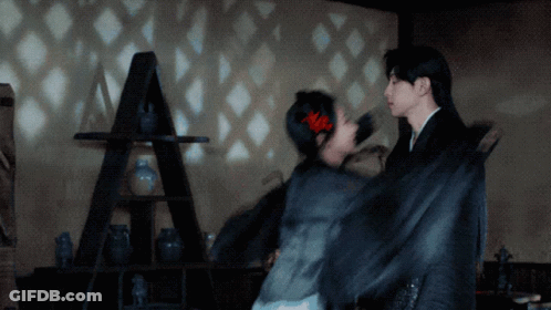 Man And Woman Dancing With Ladder GIF