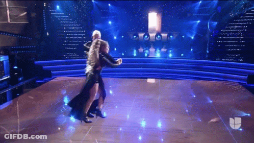 Man And Woman Dancing With US Flag GIF