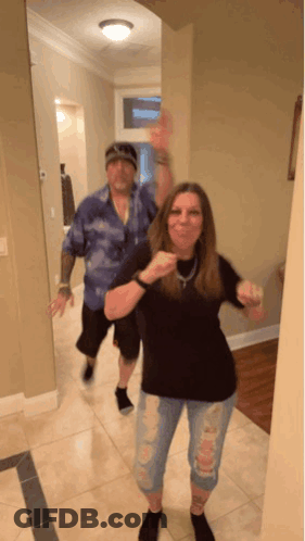 Man And Woman Dancing Woman Pointing At Camera GIF