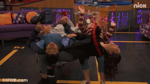 Man And Woman Doing Handstand GIF