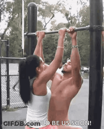 Man And Woman Doing Pull Ups GIF