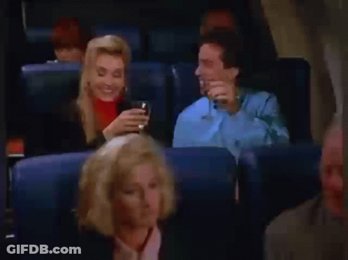 Man And Woman Drinking Beer On Airplane GIF