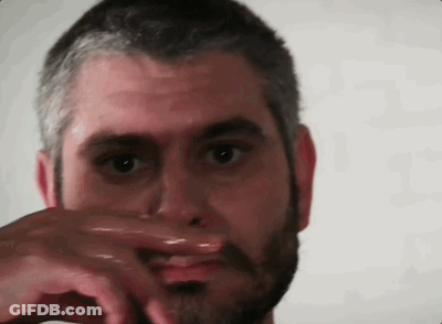 Man And Woman Drinking In Front Of After Dark Sign GIF