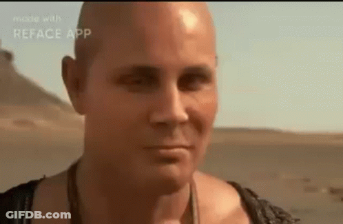 Man And Woman Facing Mummy In Dark Room GIF