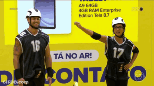 Man And Woman Facing Yellow Sign Ta No Ar GIF