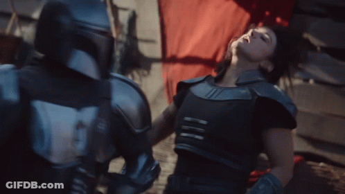 Man And Woman Fighting In Armor GIF