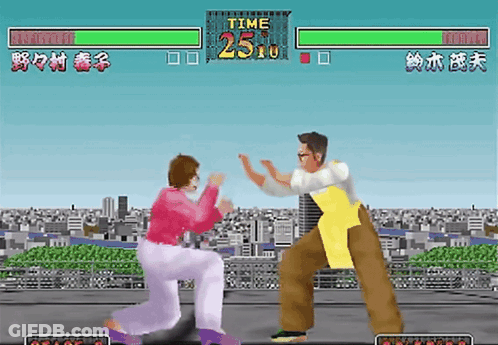 Man And Woman Fighting Video Game GIF