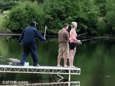 Man And Woman Fishing On Dock GIF