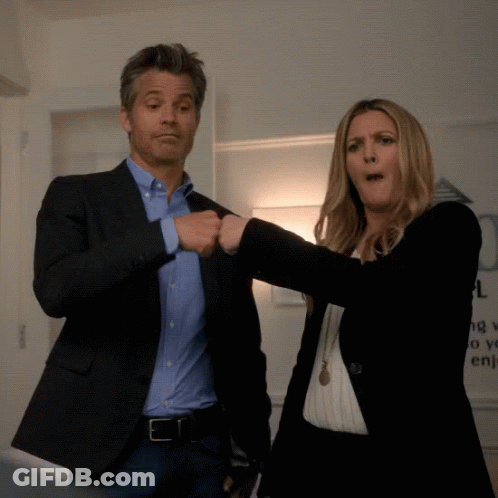 Man And Woman Fist Bumping GIF
