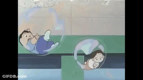 Man And Woman Floating In Bubbles In Pool GIF