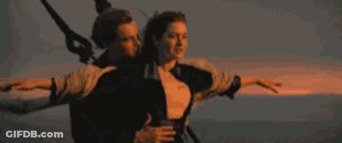 Man And Woman Flying Through Ocean Air GIF
