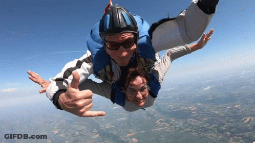 Man And Woman Flying Thumbs Up GIF