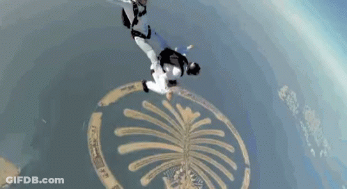 Man And Woman Flying With Logo GIF