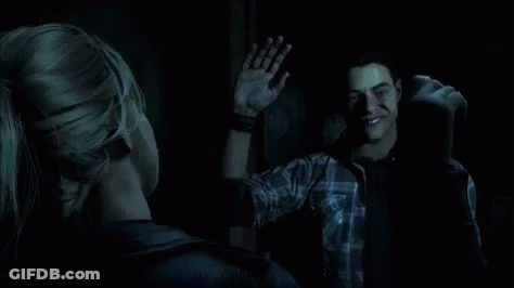Man And Woman High Fiving In Dark Video Game GIF