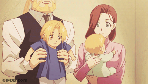 Man And Woman Holding Baby GIF