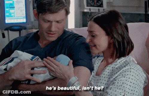 Man And Woman Holding Baby In Hospital Saying He's Beautiful Isn't He GIF