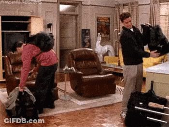 Man And Woman Holding Bag GIF
