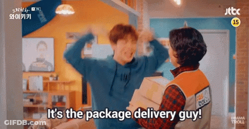 Man And Woman Holding Boxes Says It's The Package Delivery Guy GIF