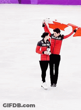 Man And Woman Holding Canadian Flag GIF