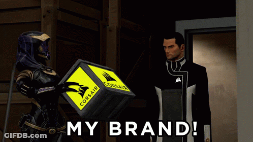Man And Woman Holding Corsair Box GIF
