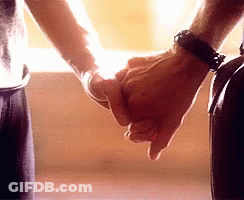 Man And Woman Holding Hands GIF