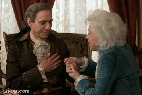 Man And Woman Holding Hands And Smiling GIF