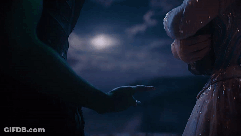 Man And Woman Holding Hands In Dark GIF