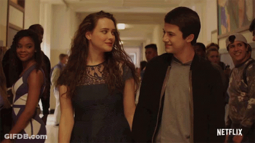 Man And Woman Holding Hands In Netflix Hallway GIF