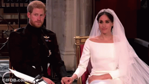 Man And Woman Holding Hands Sitting In Chair GIF