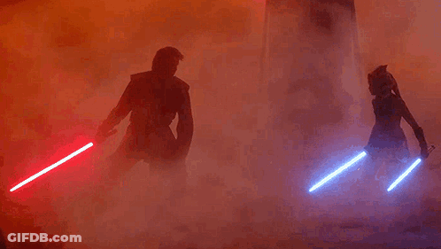 Man And Woman Holding Lightsabers GIF