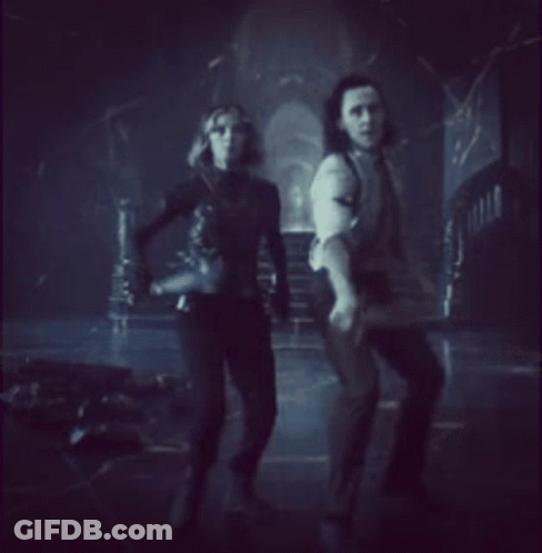 Man And Woman Holding Swords GIF