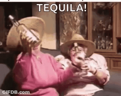 Man And Woman Holding Tequila Bottles GIF