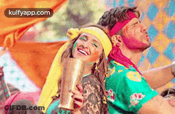 Man And Woman Holding Trophy GIF