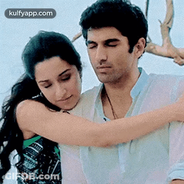 Man And Woman Hugging GIF