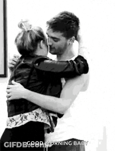 Man And Woman Hugging And Kissing GIF